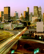 Atlanta in Georgia one of the seven American cities classified as Gamma world cities, Atlanta ranks third in the number of Fortune 500 companies headquartered in its metropolitan area, behind New York City and Houston. Several major national and international companies are headquartered in Atlanta or its nearby suburbs, including four Fortune 100 companies: The Coca-Cola Company, Home Depot, and United Parcel Service in adjacent Sandy Springs. The headquarters of Cingular Wireless, the largest mobile phone service provider in the United States, can be found a short distance inside the Perimeter beside Georgia State Route 400. Newell Rubbermaid is one of the most recent companies to relocate to the metro area; in October 2006, it announced plans to move its headquarters to Sandy Springs. Other headquarters for some major companies in Atlanta and around the metro area include Arby's, Chick-Fil-A, Earthlink, Equifax, Georgia-Pacific, Oxford Industries, Southern Company, SunTrust Banks, and Waffle House. Over 75% of the Fortune 1000 companies have a presence in the Atlanta area, and the region hosts offices of about 1,250 multinational corporations